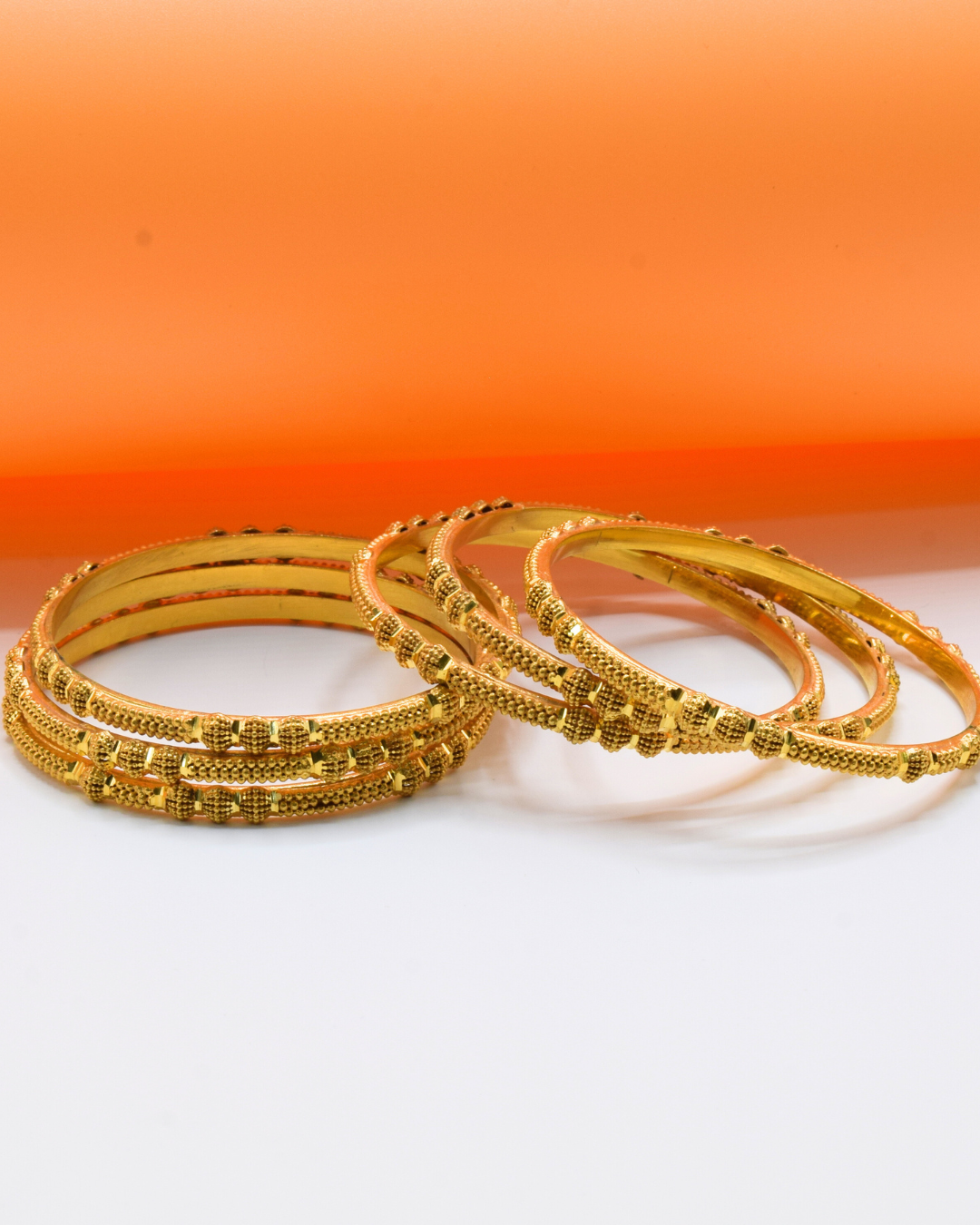 GOLD BANGLES