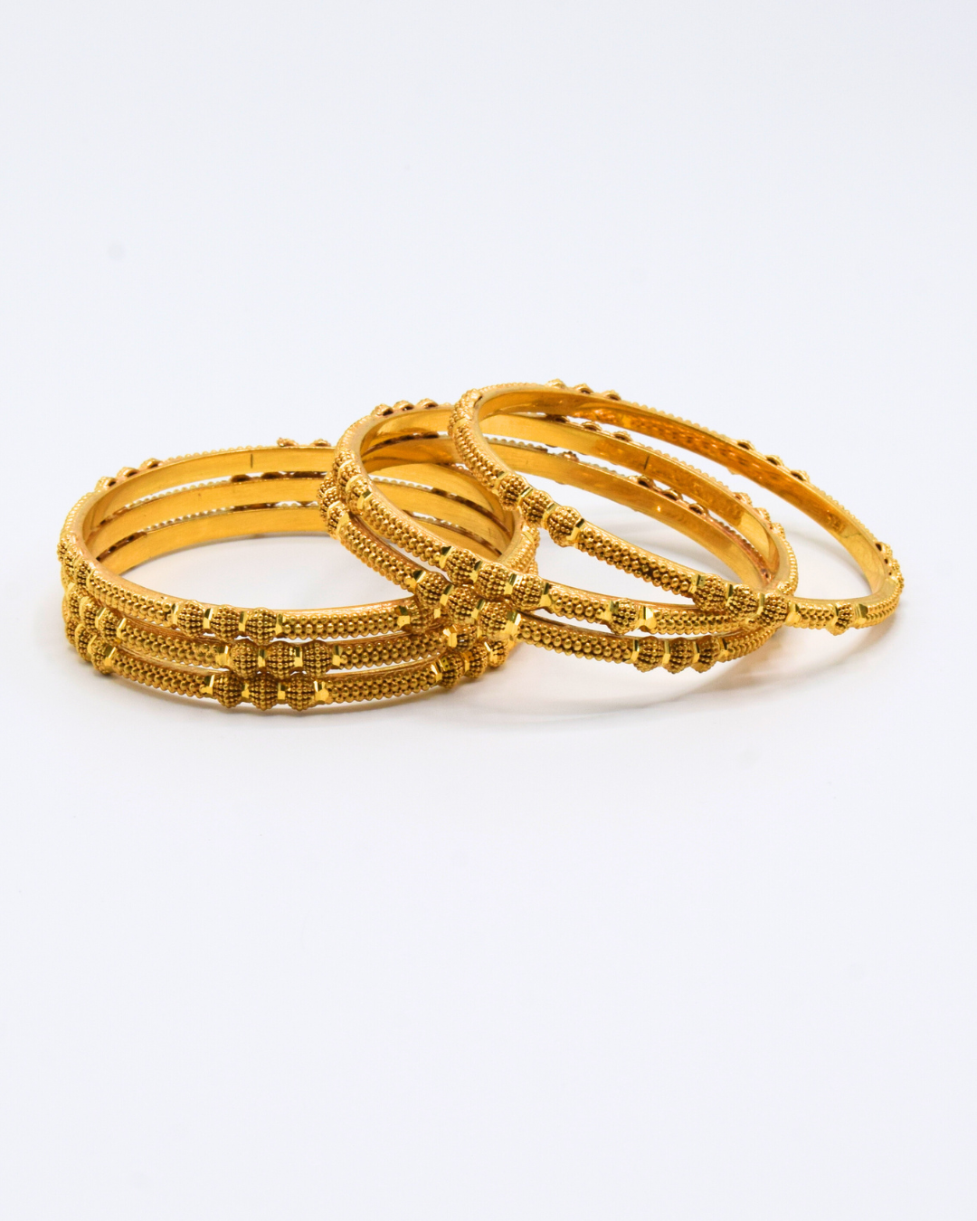 GOLD BANGLES