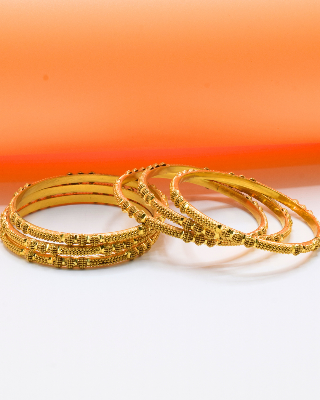 GOLD BANGLES