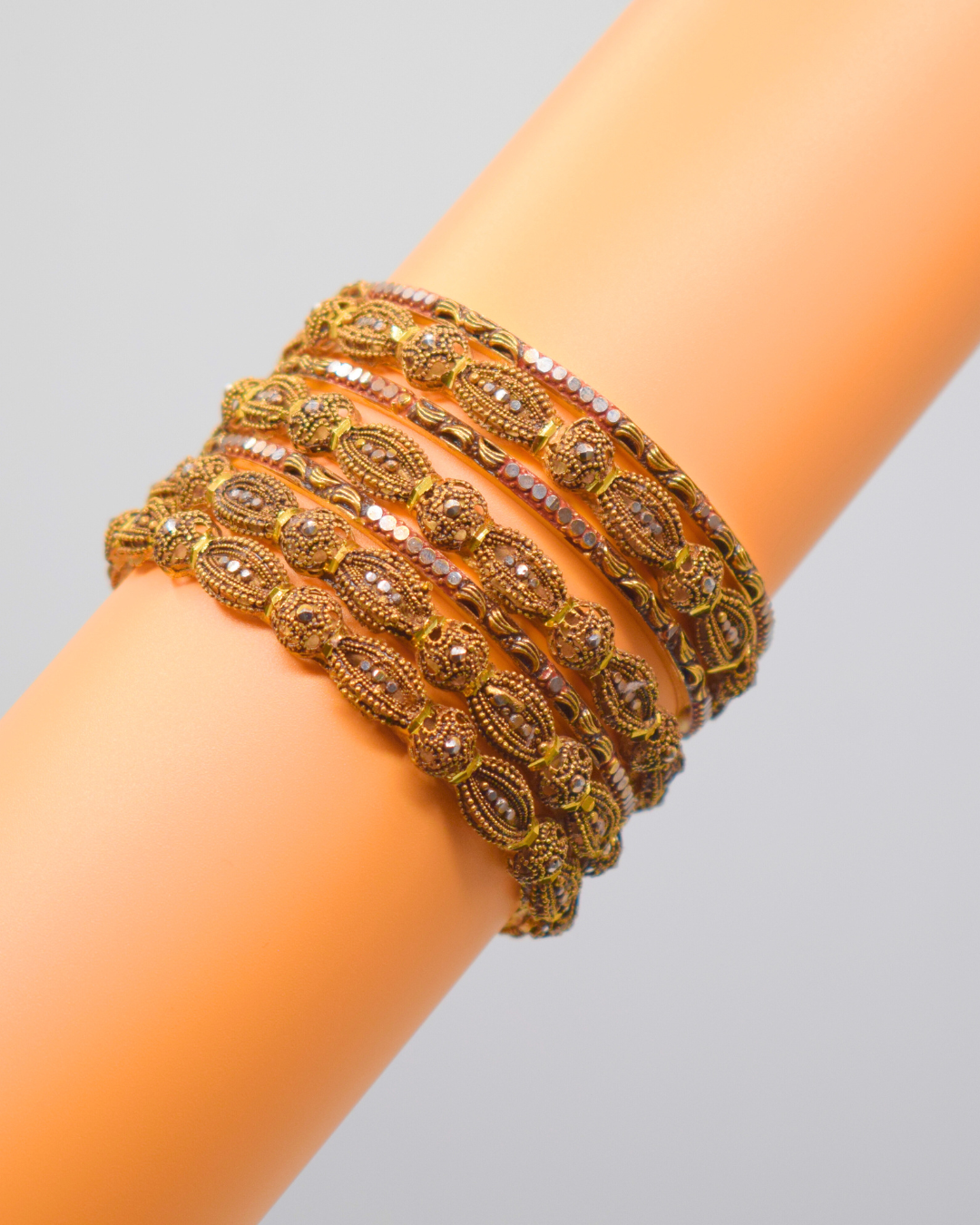 GOLD BANGLES