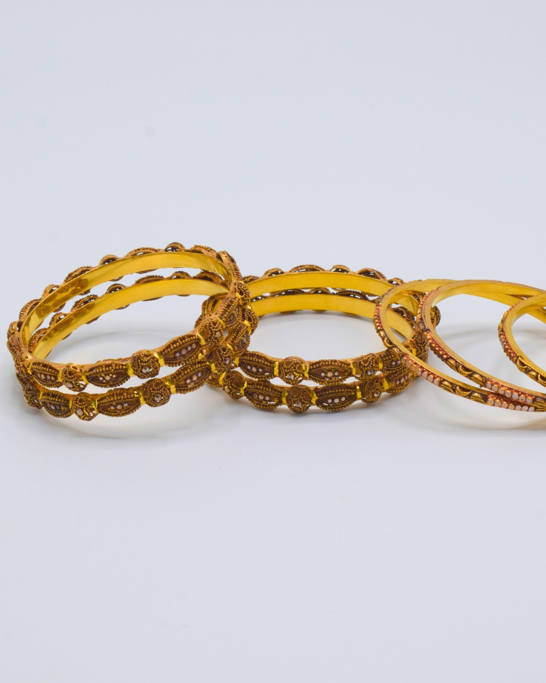 GOLD BANGLES