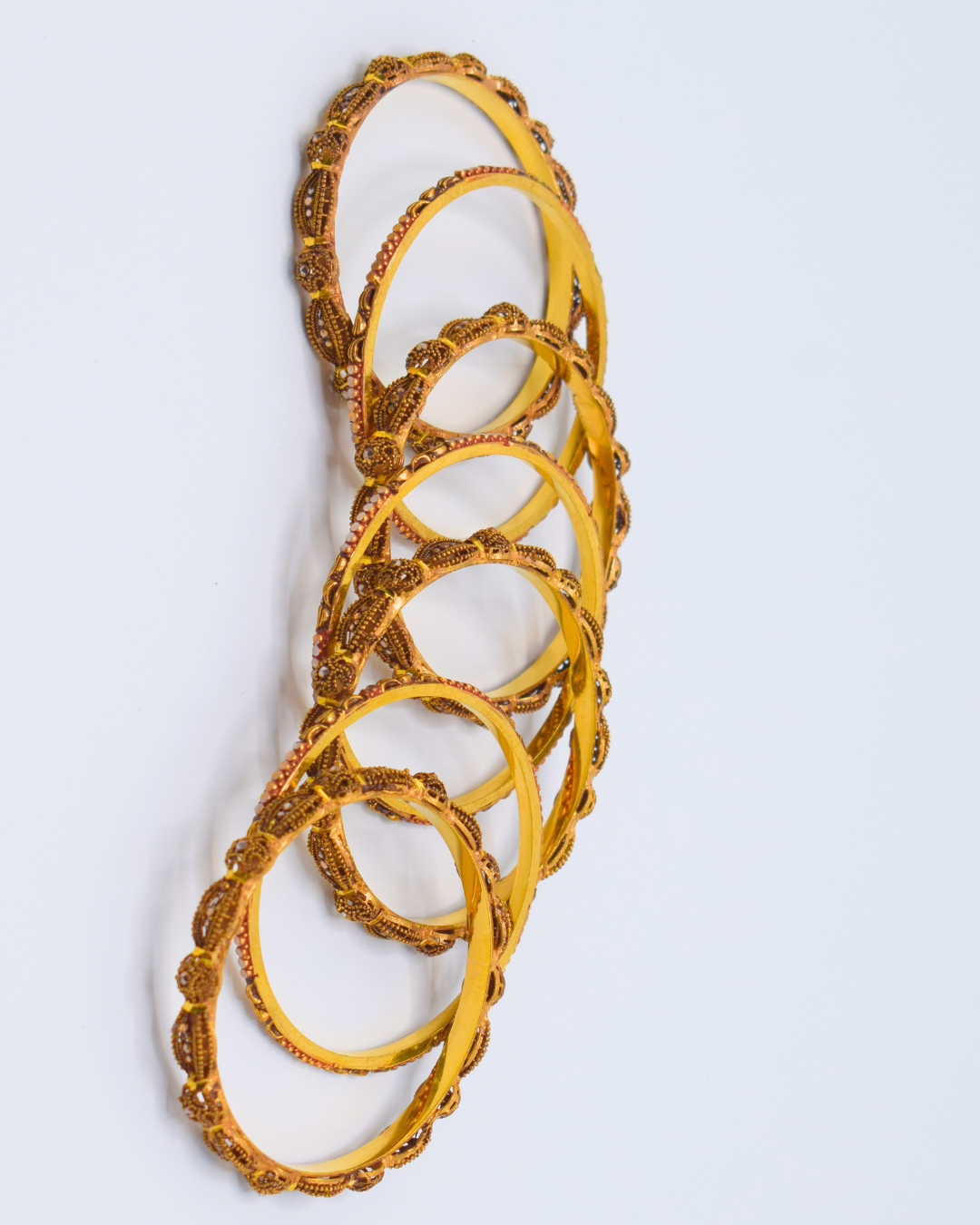 GOLD BANGLES