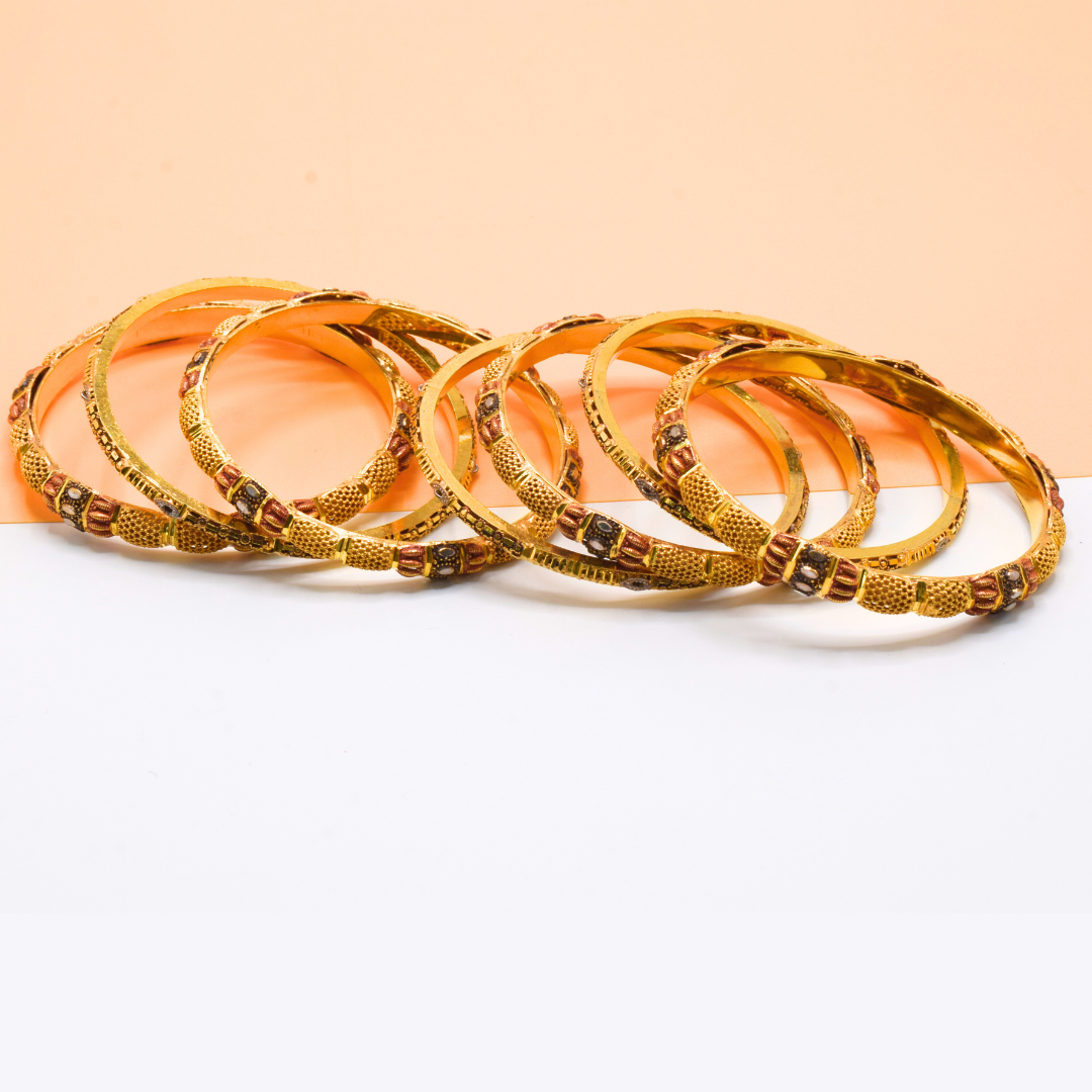 GOLD BANGLES