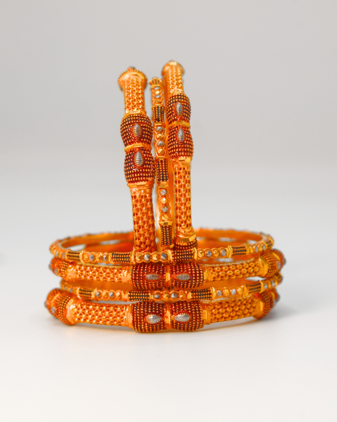 GOLD BANGLES