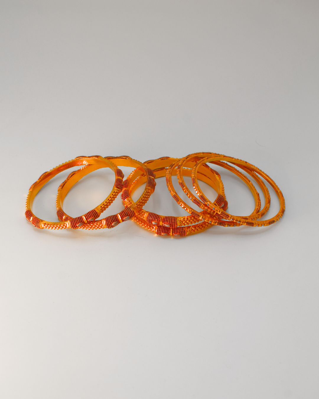 GOLD BANGLES