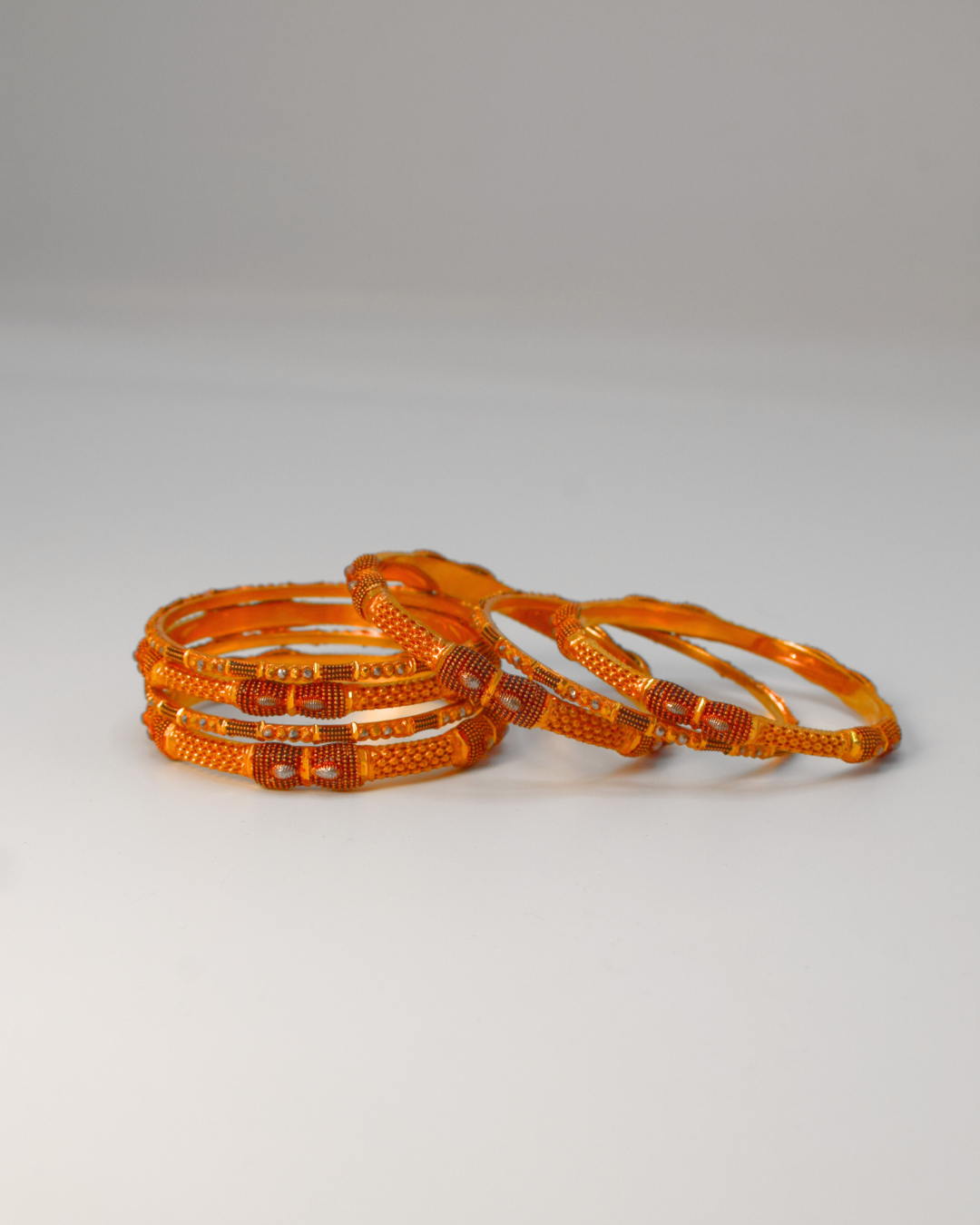GOLD BANGLES