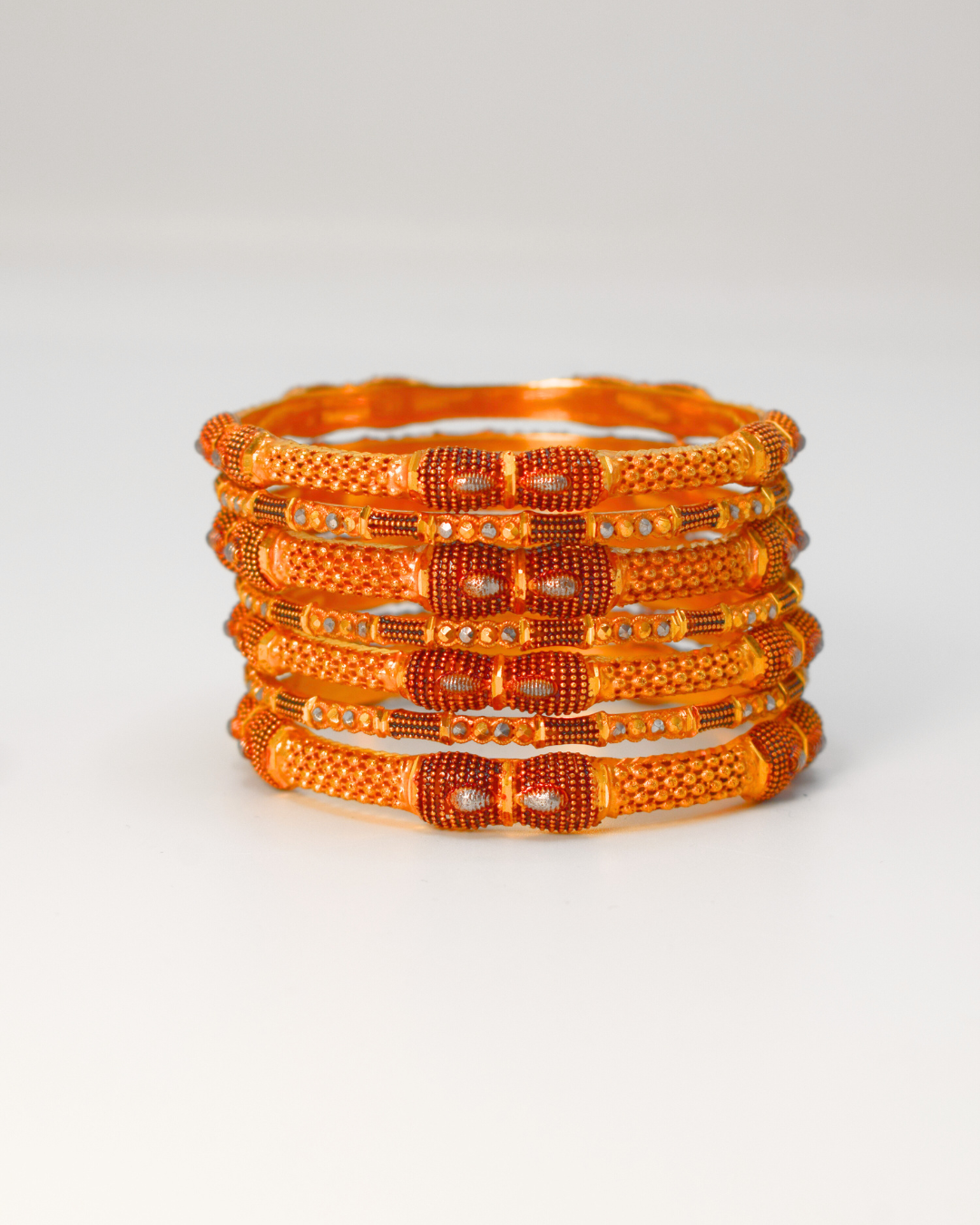 GOLD BANGLES