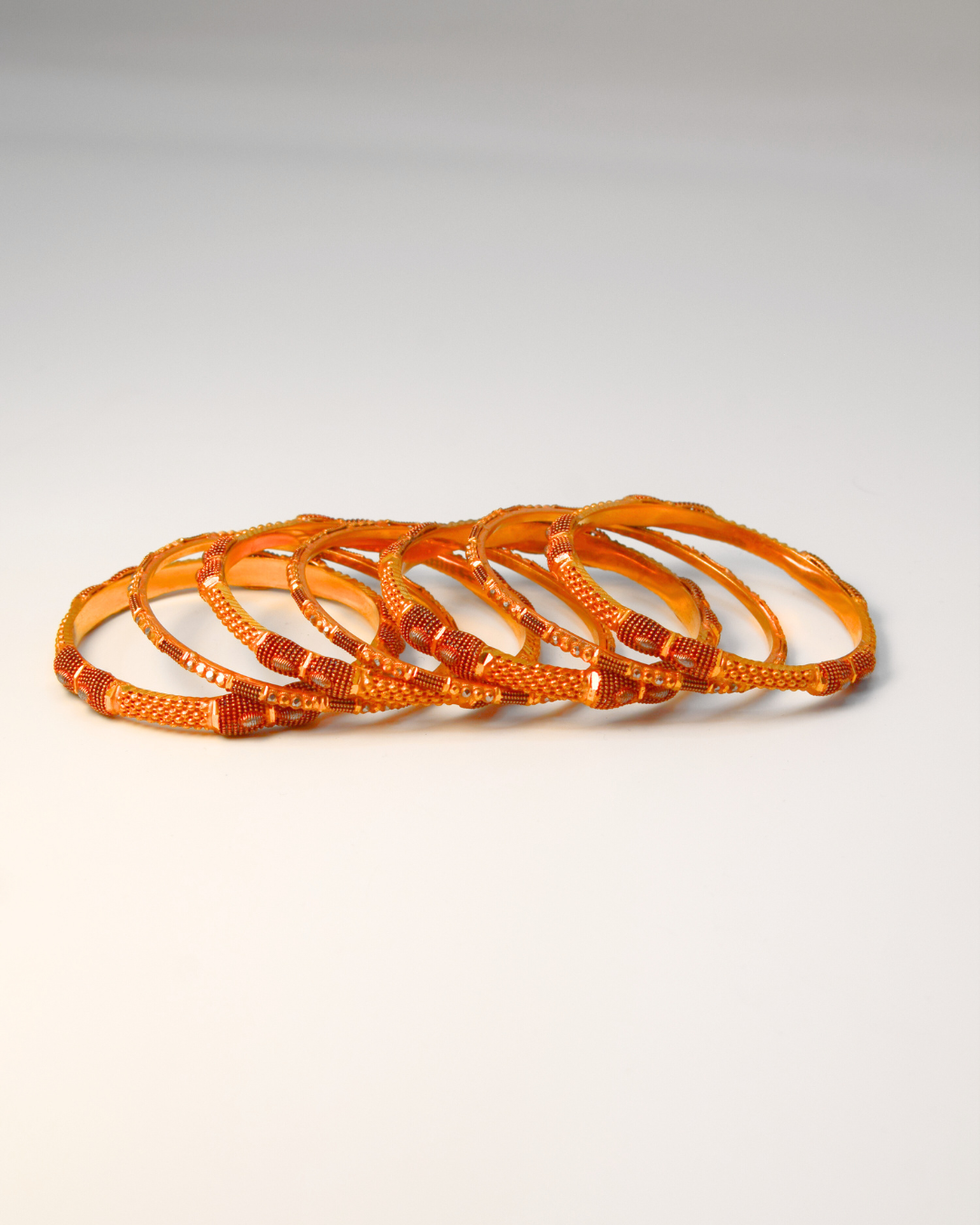 GOLD BANGLES