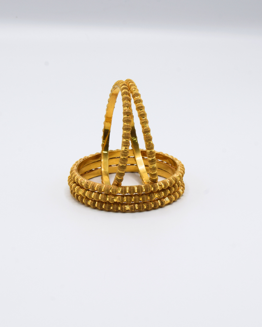 GOLD BANGLES